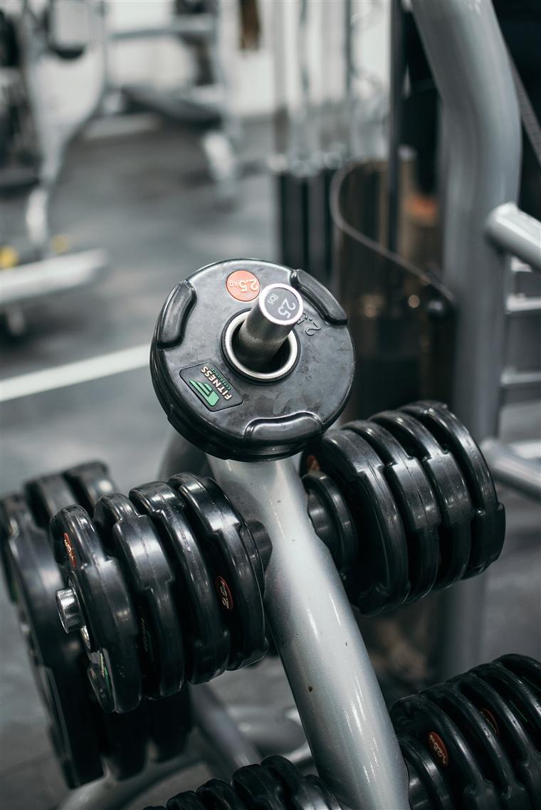 A rack of heavy hex dumbbells